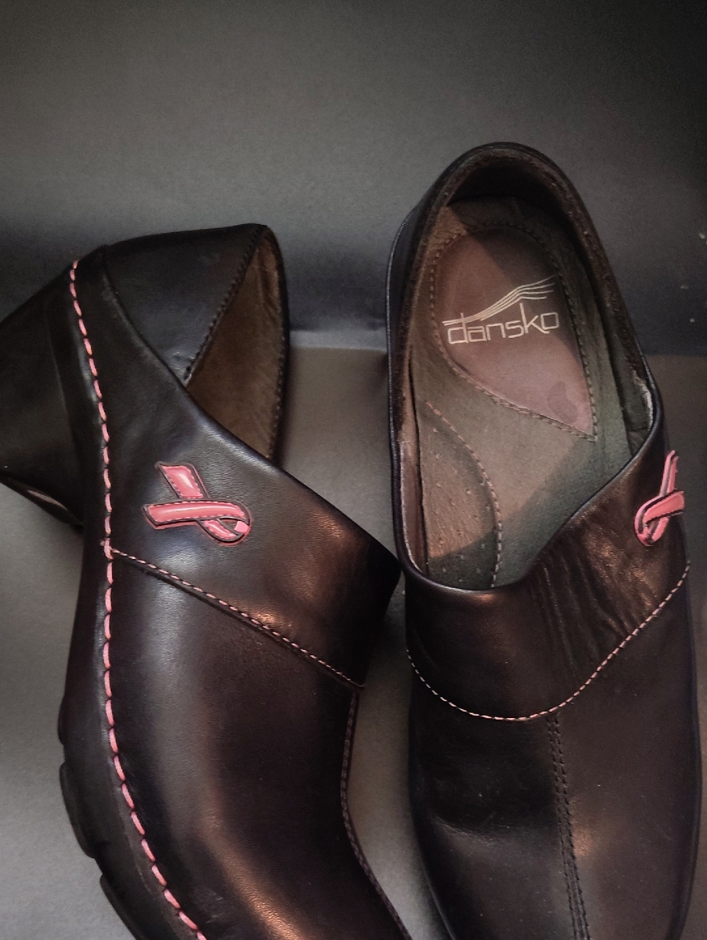 Dansko Men’s Black Leather Clogs with Pink Accent